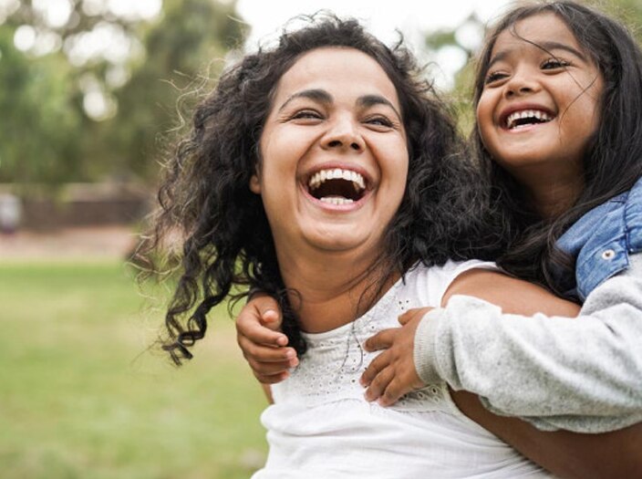 Mother and daughter laughning