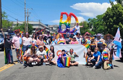 Large group of BD associates, OPEN ARG members and their families and friends at local Pride parade